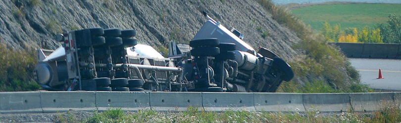 a truck accident on a downhill curve