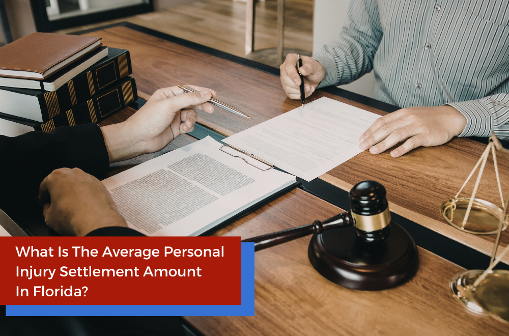 a client discussing his possible settlement with a personal injury lawyer